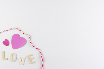 word LOVE and pink hearts on white background with space for text, Love icon, valentine's day, relationships concept