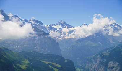 Fototapeta na wymiar Alpine peaks landskape. Lauterbrunnen, Jungfrau, Bernese highland. Alps, tourism, journey, hiking concept.