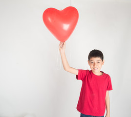 Boy  sibling with balloon  heart shape of love