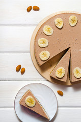 Delicious banana cake on table top view. Banana cheesecake.