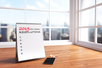 3D Rendering : illustration of modern interior Creative designer office desktop with white calendar. close up calendar mock up on wooden desk working place. light from outside. city view