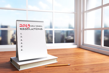 3D Rendering : illustration of modern interior Creative designer office desktop with white calendar. close up calendar mock up on wooden desk working place. light from outside. city view