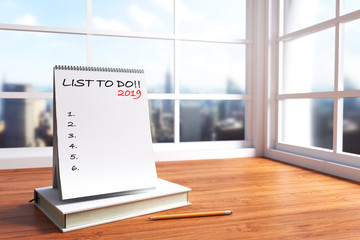 3D Rendering : illustration of modern interior Creative designer office desktop with white calendar. close up calendar mock up on wooden desk working place. light from outside. city view