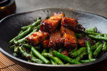 Spicy stir-fried green beans with pork belly