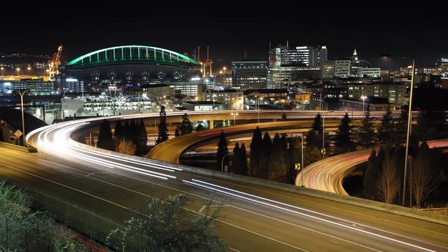 Jose Rizal Bridge View of Seattle Freeway at Night with Lit Sports Stadium