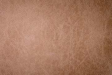 Fototapeta premium Textured background surface of leather upholstery furniture close-up. burlap brown color fabric structure
