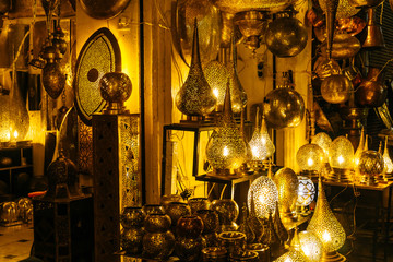 Fototapeta na wymiar Moroccan oriental lantern and lamp in the market at Marrakech medina, Morocco