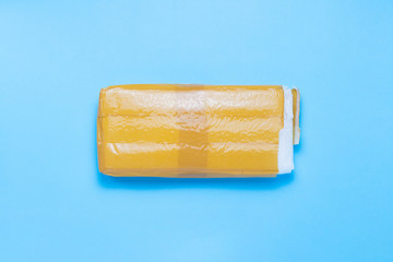 Unpacked delivery package with an order on a blue isolated background. Concept parcel, cargo, order from China. Flat lay, top view