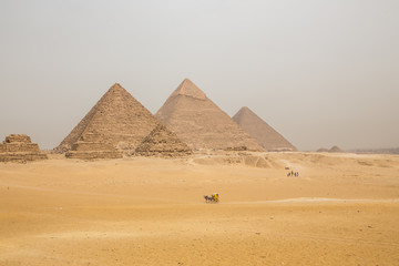 Fototapeta na wymiar Egypt. Cairo - Giza. General view of pyramids from the Giza Plateau 