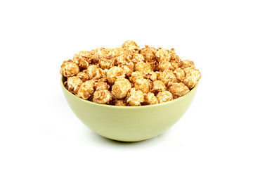 Fototapeta na wymiar caramel popcorn in a bowl on a white background
