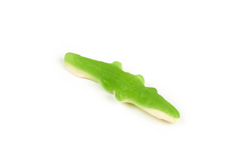 jelly candies in the crocodile shape isolated on white background.