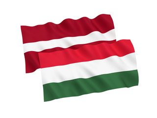 Flags of Hungary and Latvia on a white background