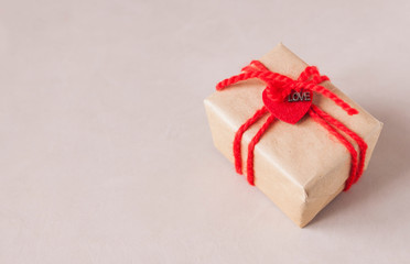 Valentine gift box with ribbon and heart decor. Close up. Selective focus.