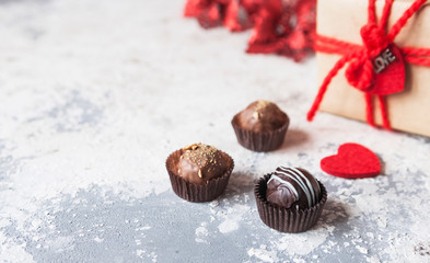 Chocolate and heart on St. Valentine's day love. The concept of postcards for lovers. Close up. Selective focus.