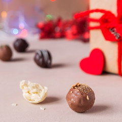 Chocolate and heart on St. Valentine's day love. The concept of postcards for lovers. Close up. Selective focus.