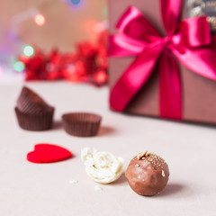 Chocolate and heart on St. Valentine's day love. The concept of postcards for lovers. Close up. Selective focus.