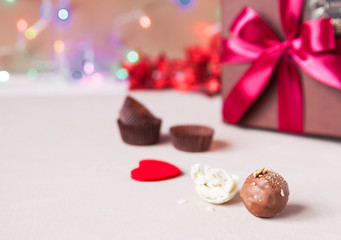 Chocolate and heart on St. Valentine's day love. The concept of postcards for lovers. Close up. Selective focus.