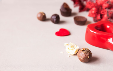 Chocolate and heart on St. Valentine's day love. The concept of postcards for lovers. Close up. Selective focus.