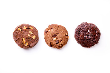 Three types of chocolate cookies on white background