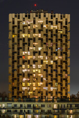 Grenoble, France, January 2019 : One of the three towers at night, ile verte neighbourhood