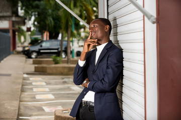 portrait of young african man, smiling.