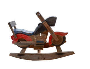 side view wooden colored rocking motorcycle on white background, copy space