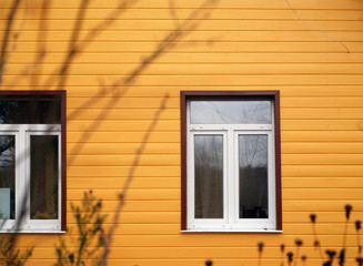 Windows and wall painted in yellow