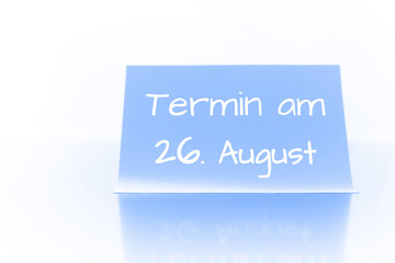 Termin am 26. August - blauer Zettel mit Notiz