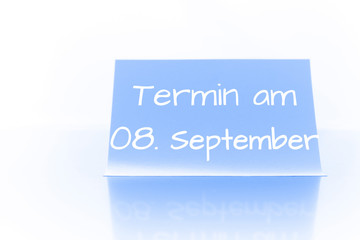Termin am 8. September - blauer Zettel mit Notiz