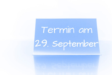 Termin am 29. September - blauer Zettel mit Notiz