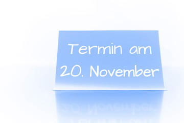 Termin am 20. November - blauer Zettel mit Notiz
