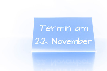 Termin am 22. November - blauer Zettel mit Notiz