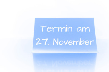 Termin am 27. November - blauer Zettel mit Notiz