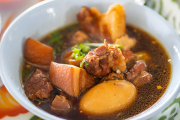 Close up of Egg and Pork in sweet brown Sauce.
