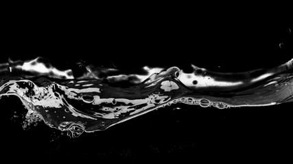 Water wave on black background