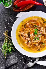 Traditional tripe soup in polish style with beef and vegetables