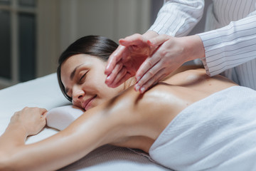 Fototapeta na wymiar Woman Enjoying a Back Massage .