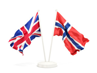 Two waving flags of UK and norway