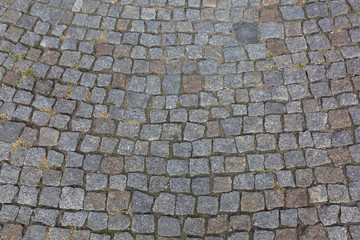 Abstract background of old cobblestone pavement in Prague, Czech Republic