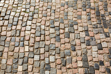 Stone road texture in sunny day