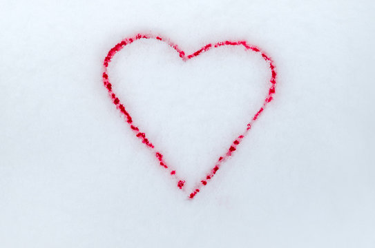 I love you. I love you Valentine's Day. Heart of snow painted in blood on Valentine's Day background. Gifts, romance, red hearts on a white background. Valentine's Day concept. Flat bed.