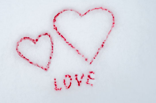 Valentines day background. I love you Valentine's Day. Heart of snow painted in blood on Valentine's Day background. Gifts, romance, red hearts on a white background. Valentine's Day concept