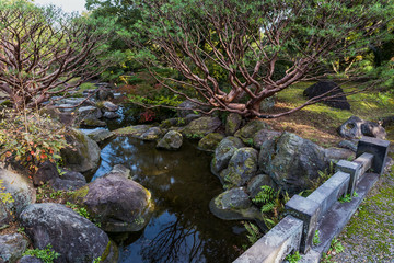 Autumn landscapes by the stream and Stone bridge
