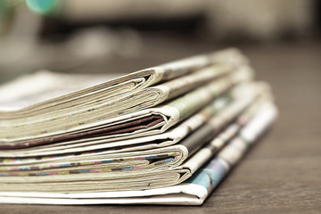 Newspaper Headlines and Articles in News Journals and Magazines. Stack of Newspapers, Business Concept          