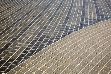 Obraz premium The pattern of the walkway in the park.