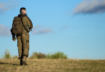 Hunting hobby. Guy hunting nature environment. Hunting weapon gun or rifle. Masculine hobby...