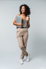 Full length of a happy young african woman