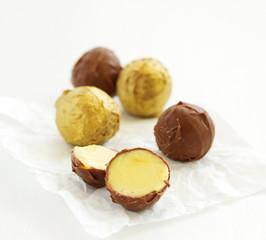 Handmade candies. Lawyer truffle with liqueur and vanilla. Home sweetness. Selective focus.
