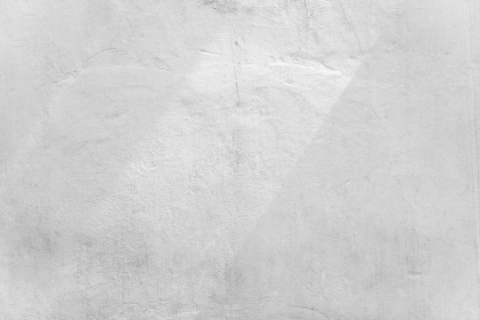 Abstract background from white concrete wall with sunlight, light and shadow.