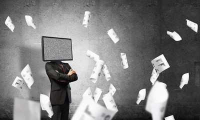 Businessman with TV instead of head.